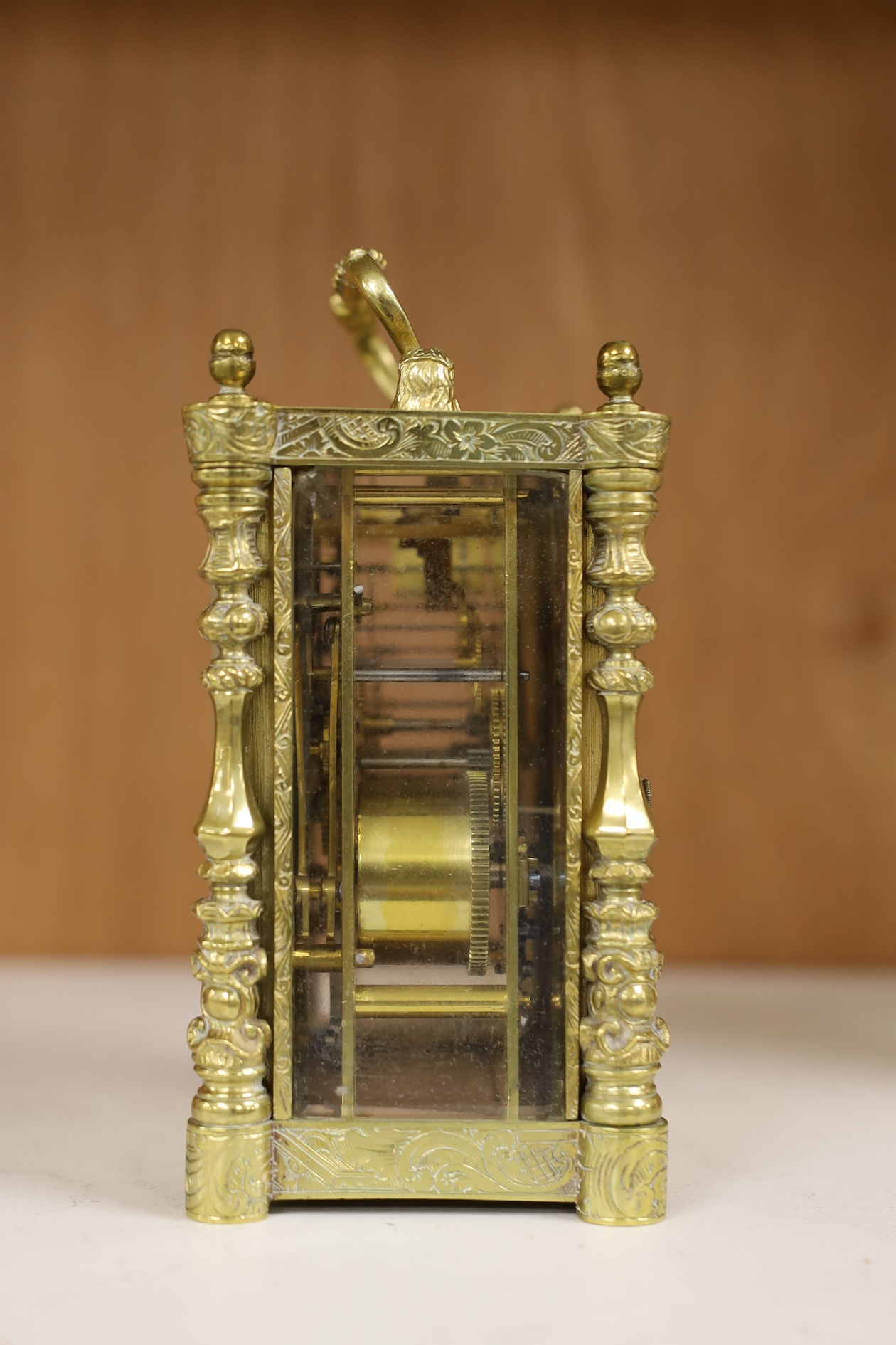 A repeating carriage clock by Auguste, Paris (missing bell), 13.5cm including handle. Condition - case and glass fair, untested if working